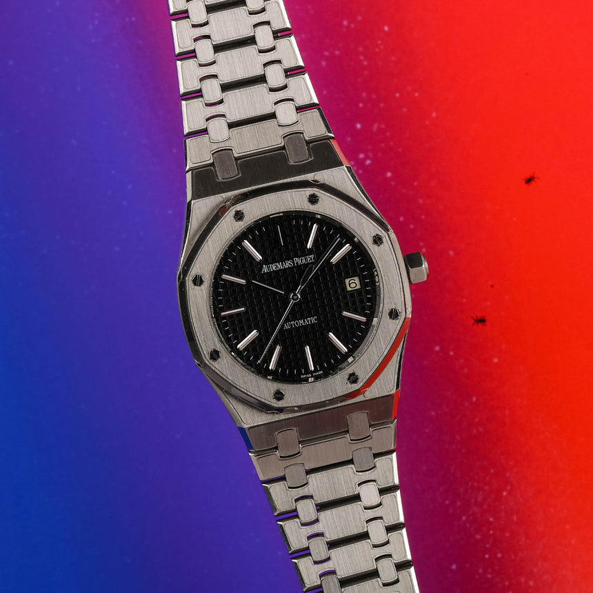 2009 Audemars Piguet Royal oak, black dial reference 15300: Mint & full set