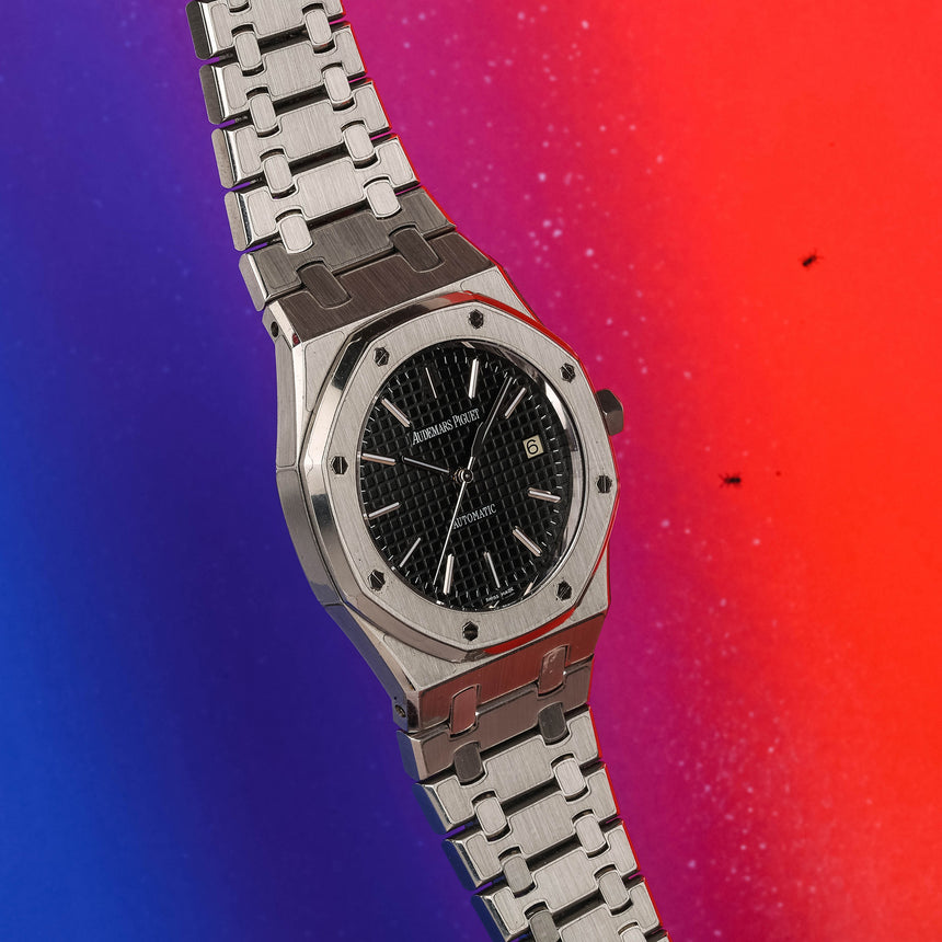 2009 Audemars Piguet Royal oak, black dial reference 15300: Mint & full set