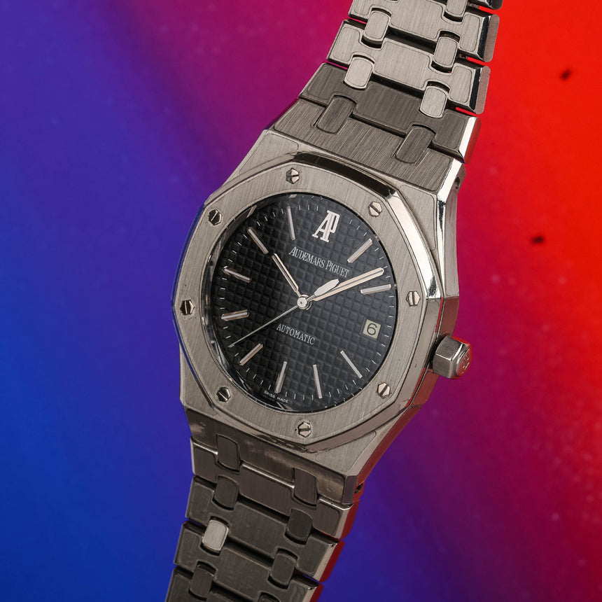 2009 Audemars Piguet Royal oak, black dial reference 15300: Mint & full set