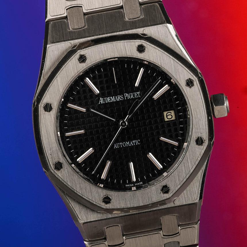 2009 Audemars Piguet Royal oak, black dial reference 15300: Mint & full set