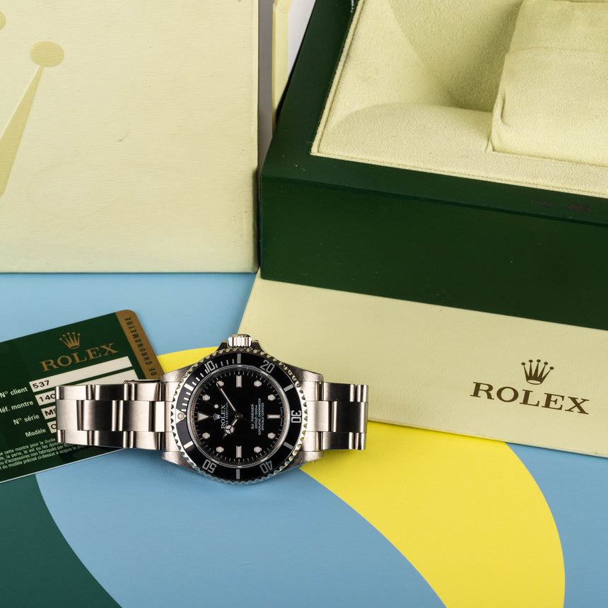 2009 Rolex Submariner ref 14060M lines: Box Papers Top