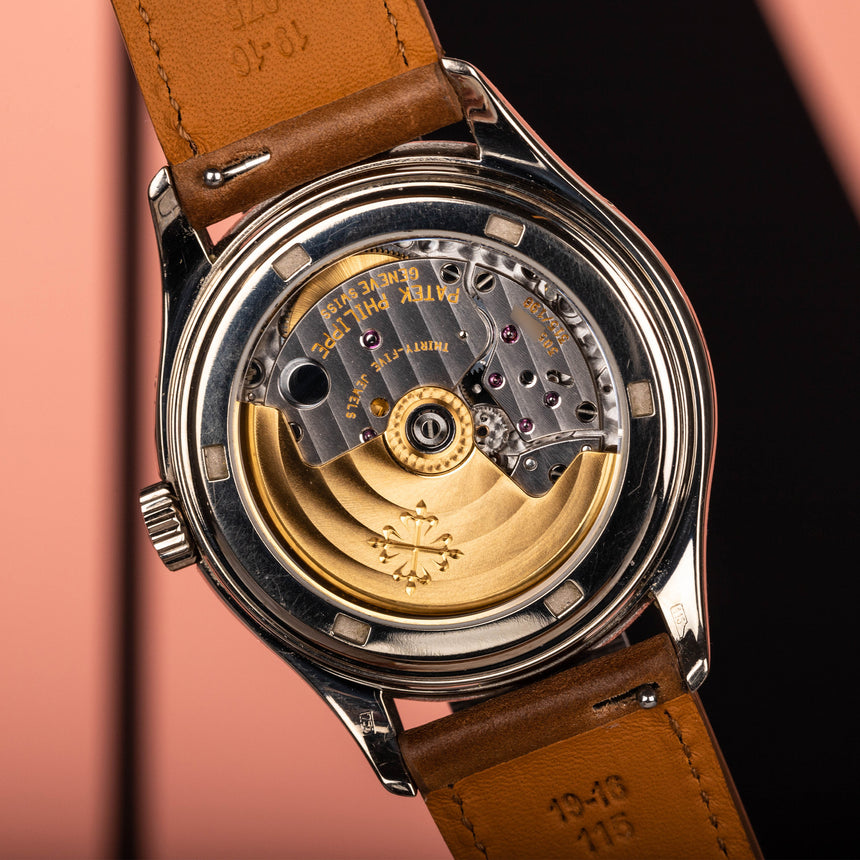 Circa 1997 Patek Philippe Annual calendar ref 5035G salmon-copper dial : Boxes and Extract from the archive